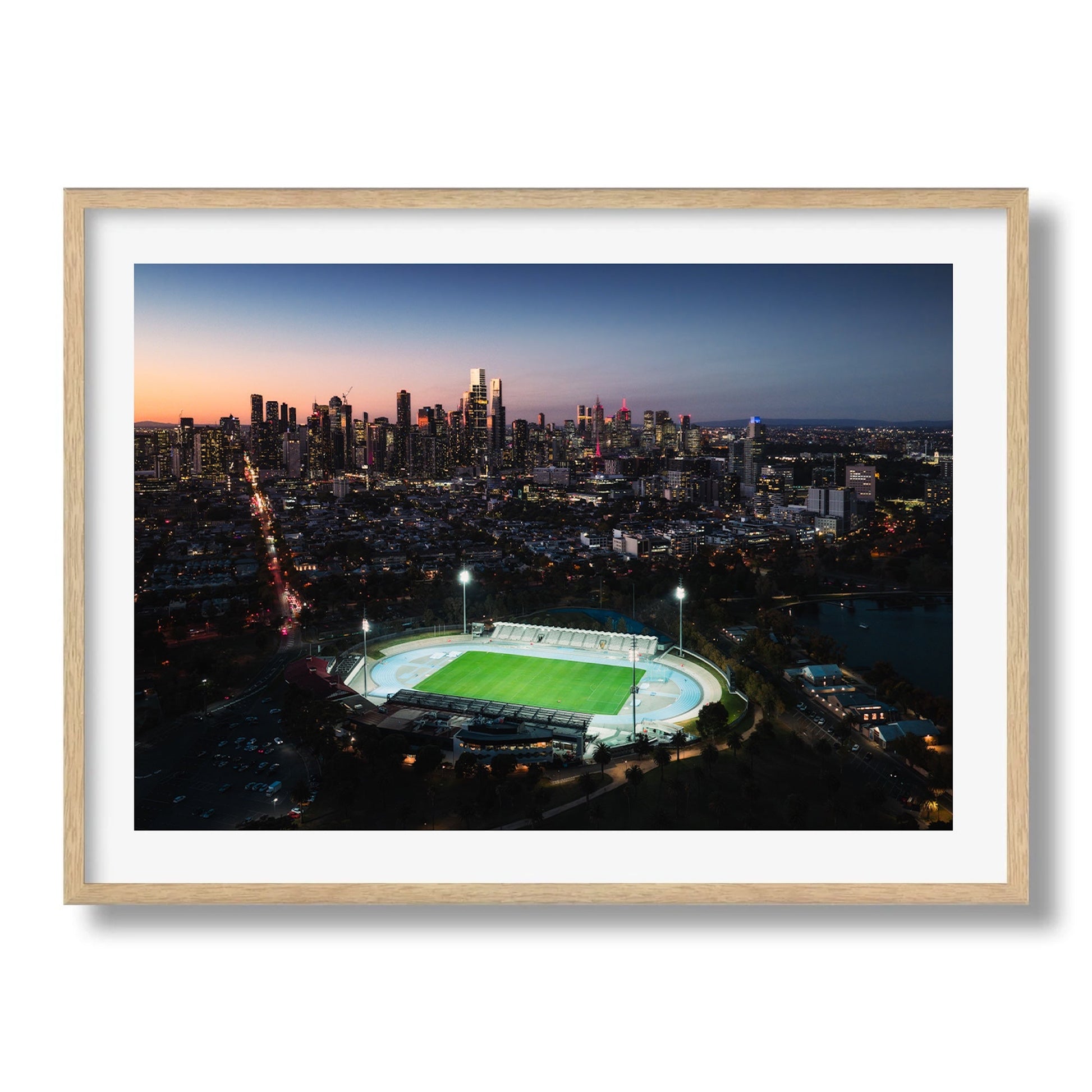 Melbourne Skyline and Lakeside Stadium at Dusk Framed Print - Architecture by Peter Yan Studio
