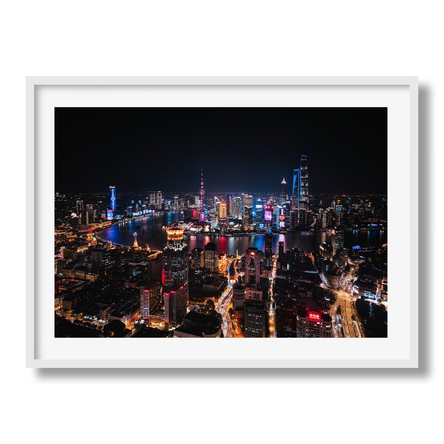 Shanghai Illuminated: A Night View from Above Framed Print - Aerial by Peter Yan Studio