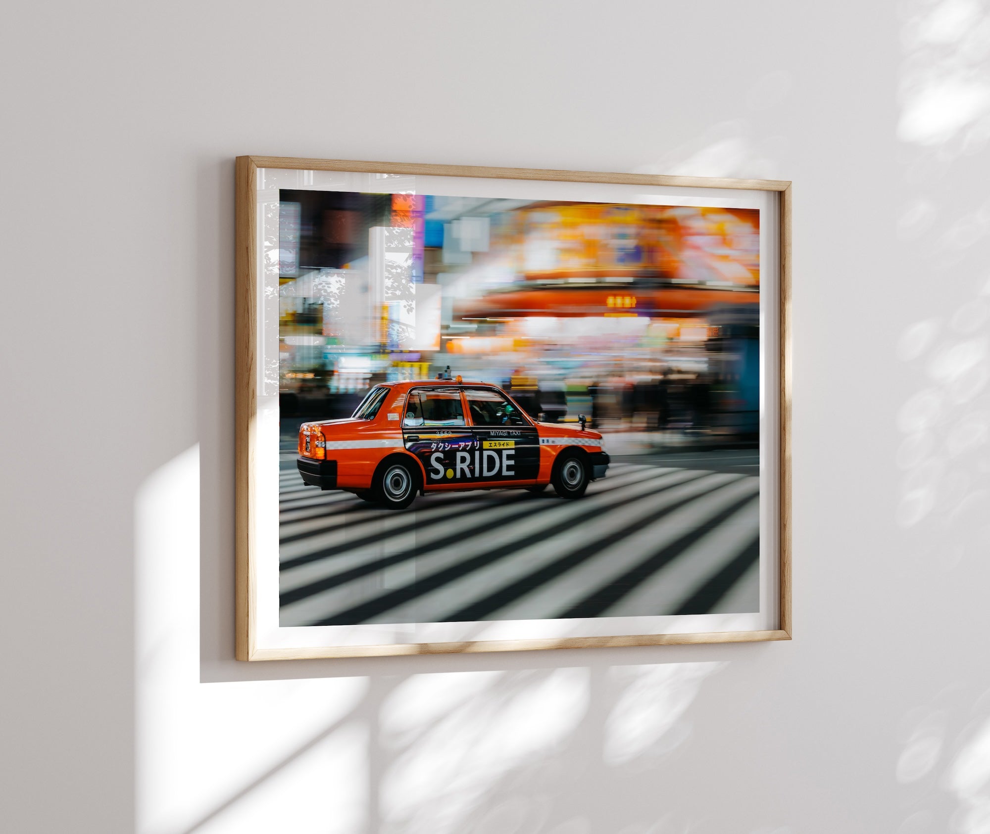 Speeding orange taxi in Shinjuku - Peter Yan Studio