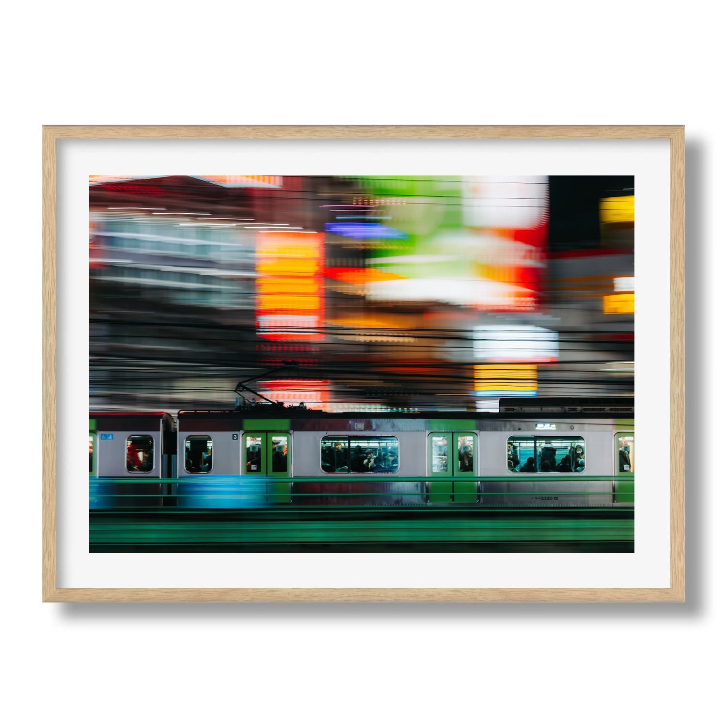 Speeding train in Shinjuku - Peter Yan Studio Framed Photo Print Wall Art