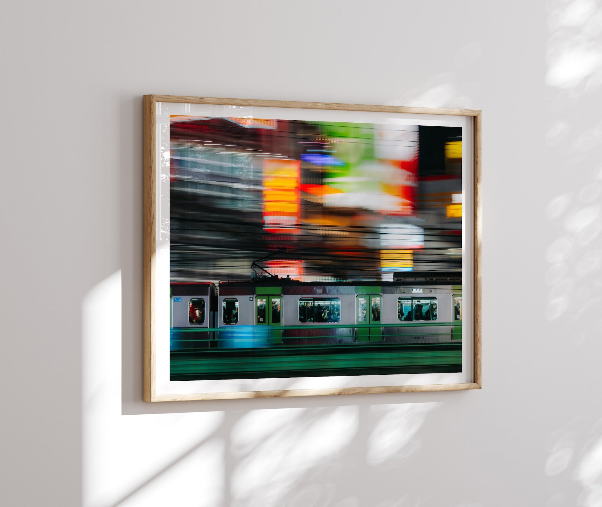 Speeding train in Shinjuku - Peter Yan Studio Framed Photo Print Wall Art
