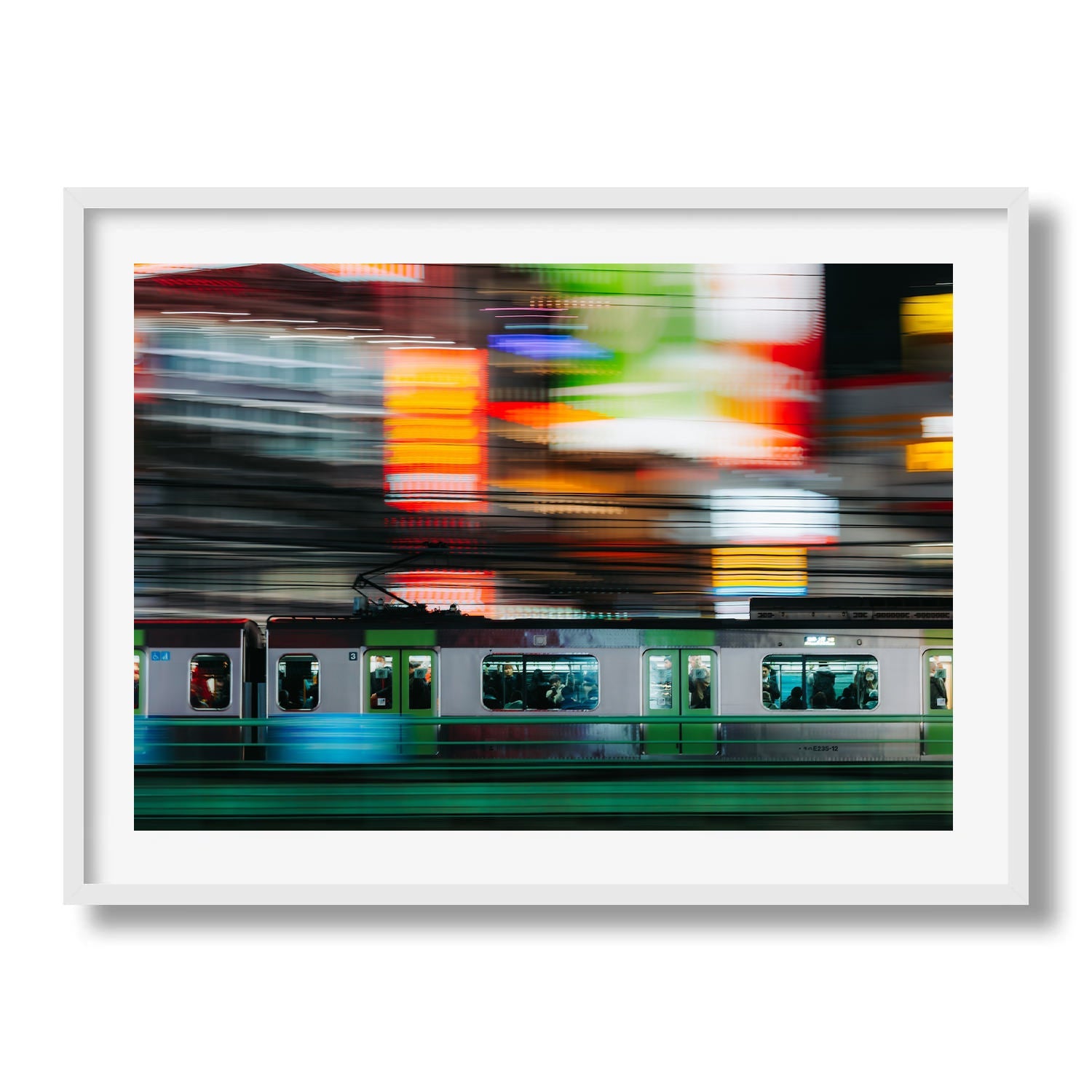 Speeding train in Shinjuku - Peter Yan Studio Framed Photo Print Wall Art