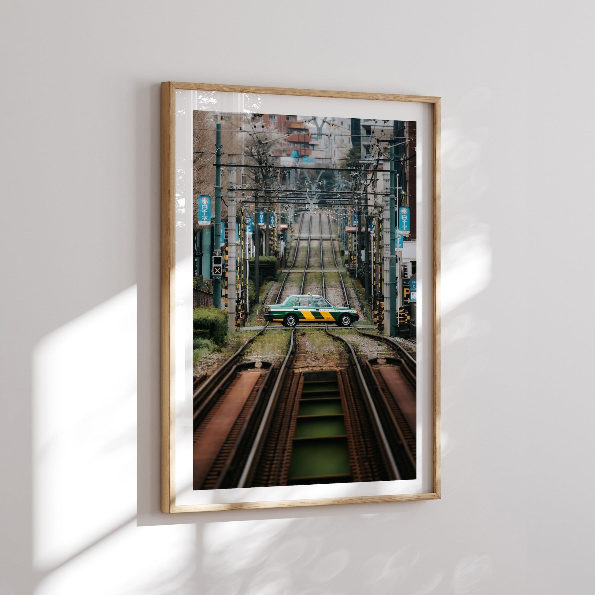 Tokyo taxi crossing tramline Framed Print - City by Peter Yan Studio