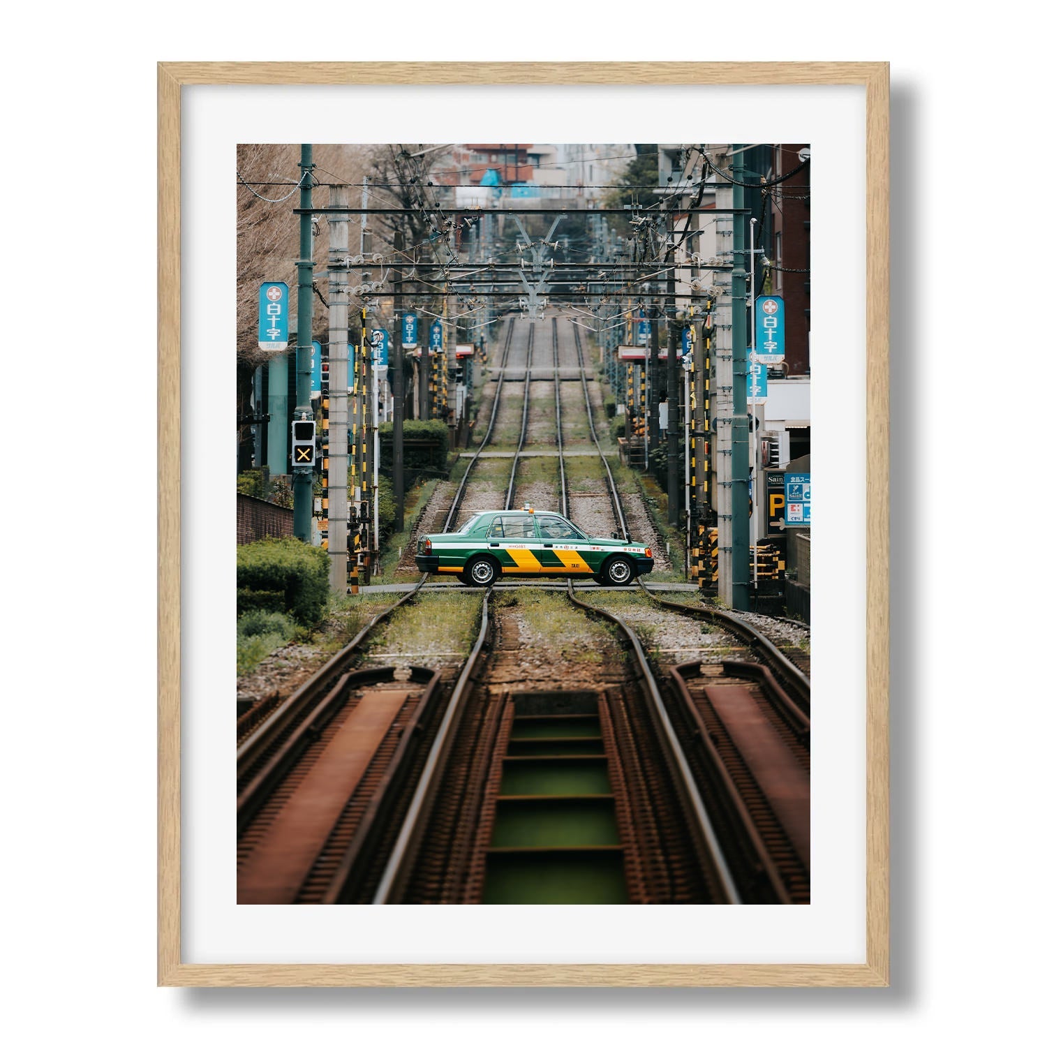 Tokyo taxi crossing tramline Framed Print - City by Peter Yan Studio